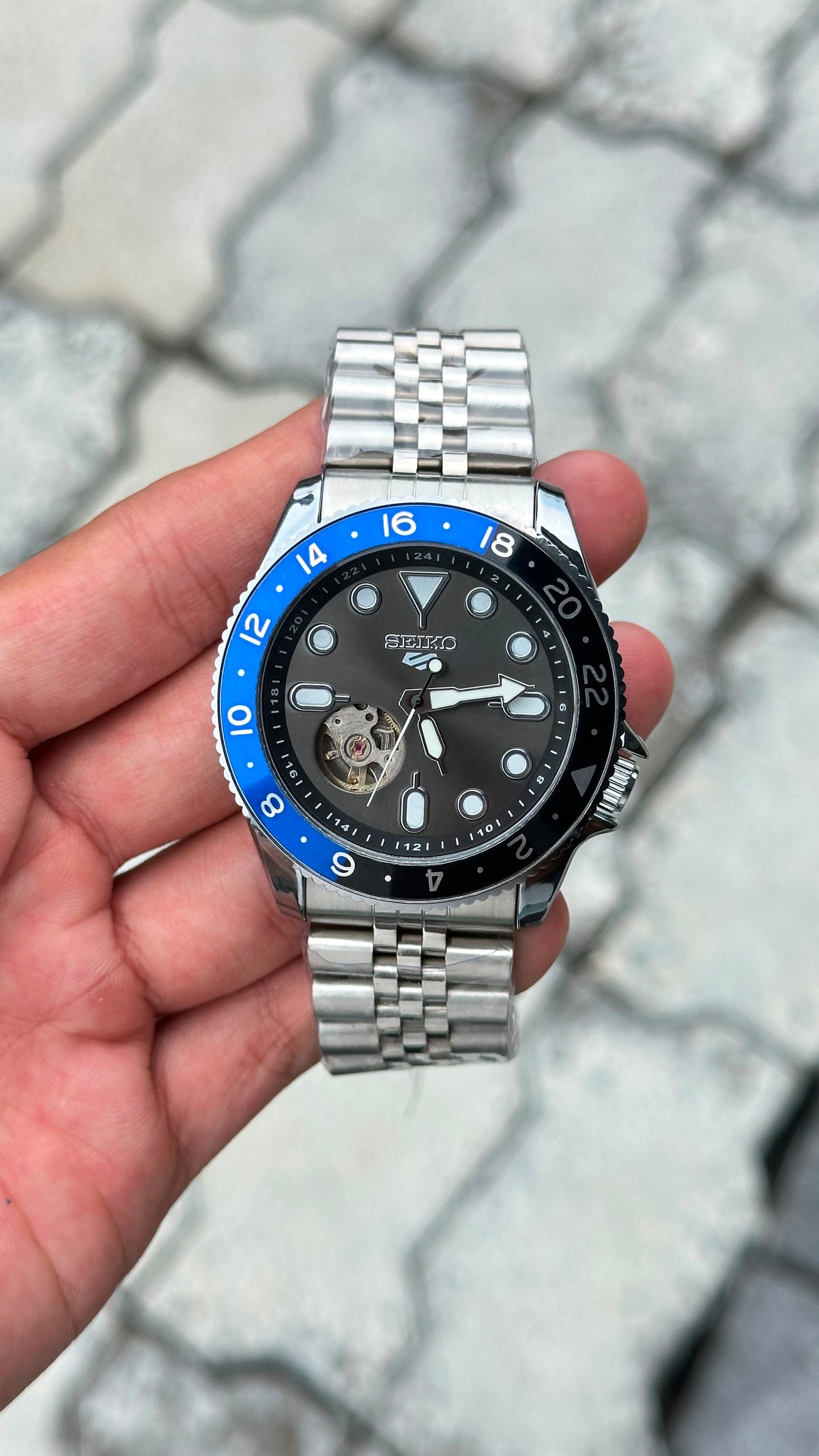 Seiko 5 Sports Black Dial Blue & Black Bezel Silver Watch