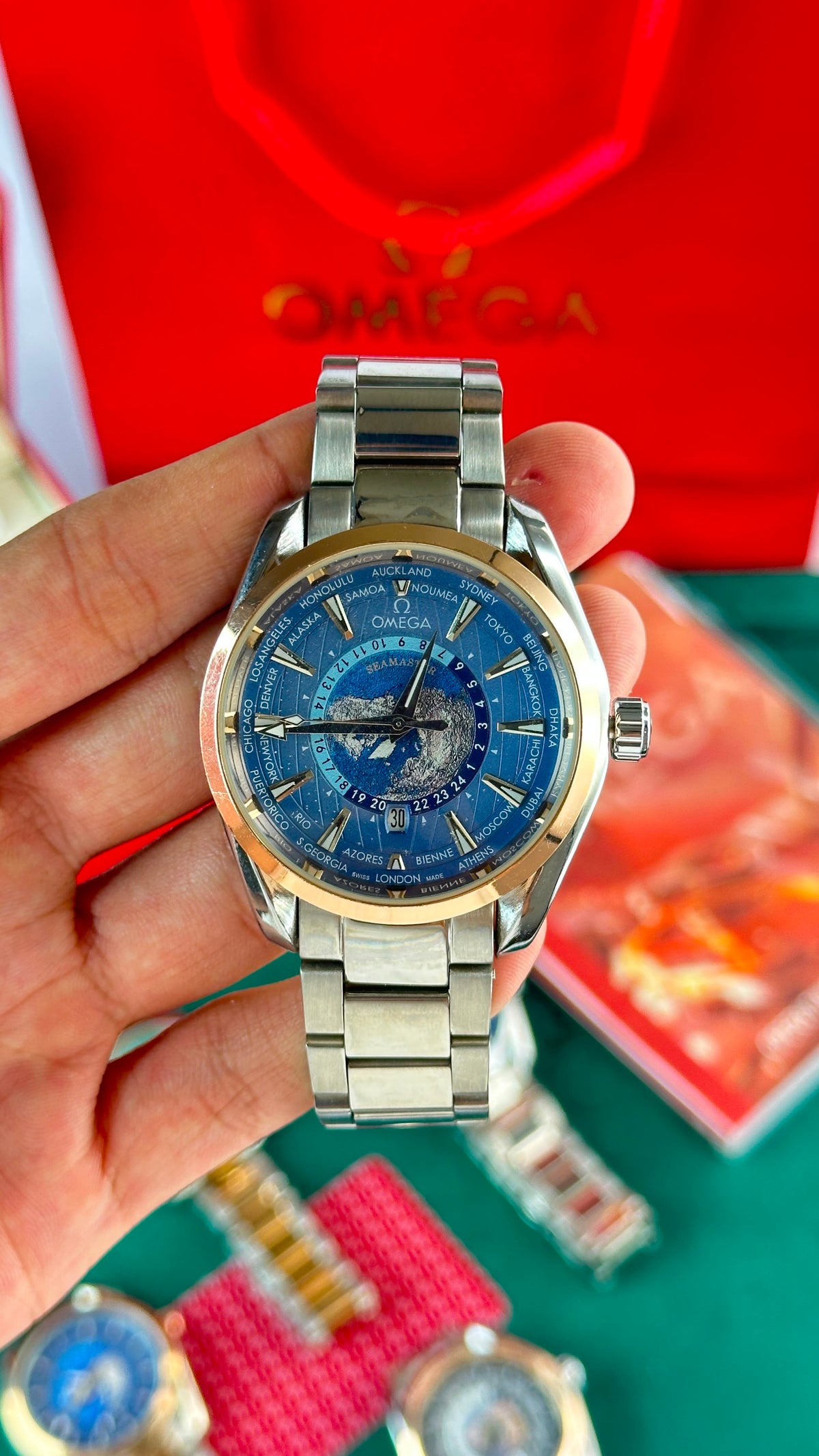 Omega Worldtimer Blue Dial Rose Gold Bezel Silver Bracelet Watch