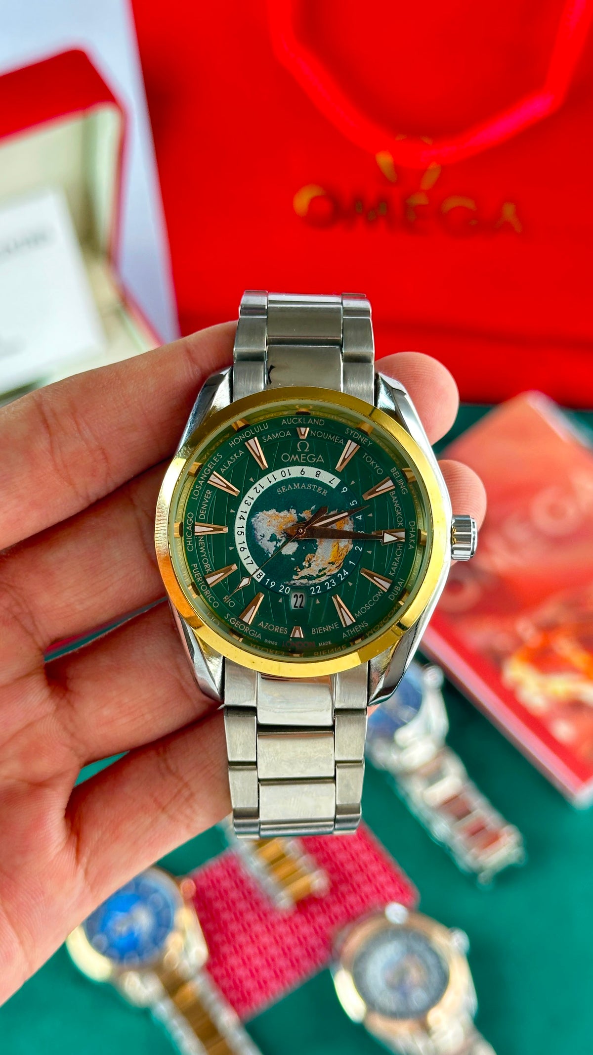 Omega Worldtimer Green Dial Gold Bezel Silver Bracelet Watch