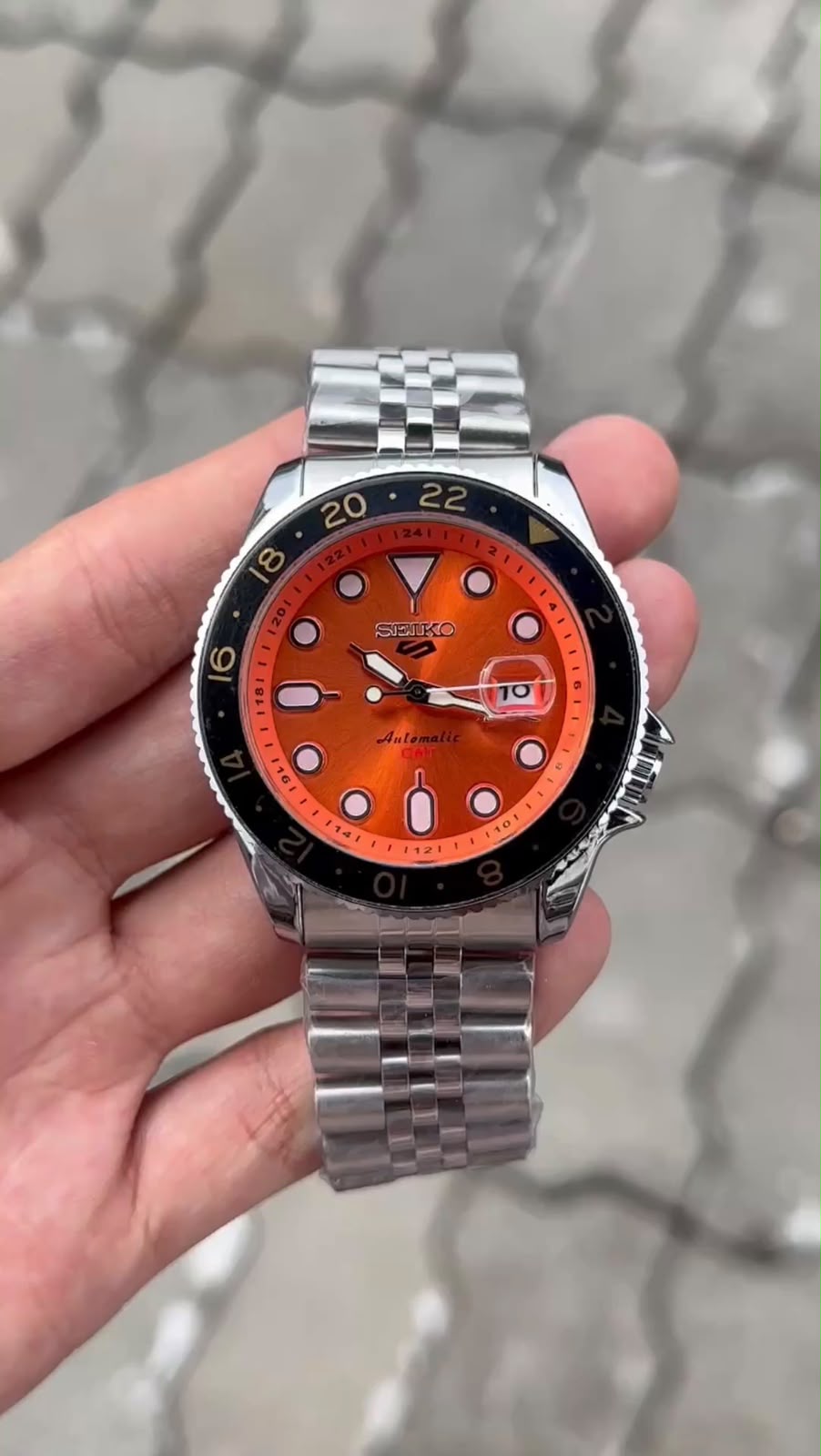 Seiko 5 Sports Orange Dial Black Bezel Silver Watch