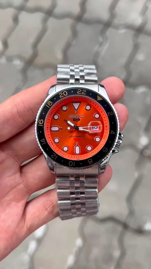 Seiko 5 Sports Orange Dial Black Bezel Silver Watch