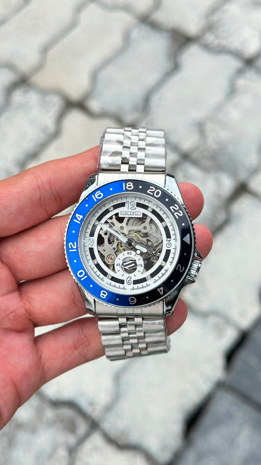 Seiko White dial Blue & black Bezel Skeleton Automatic Watch